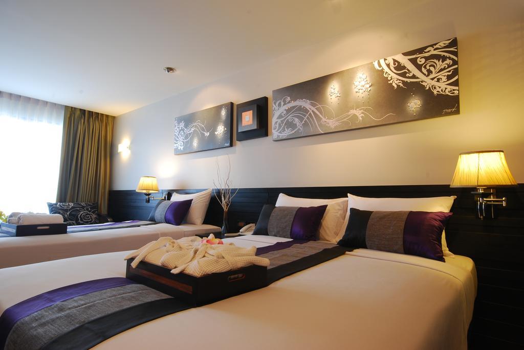 Quarto Grand Triplo Deluxe