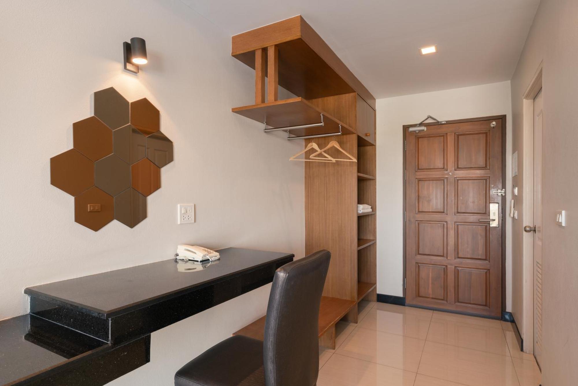 Quarto Triplo Deluxe com Varanda